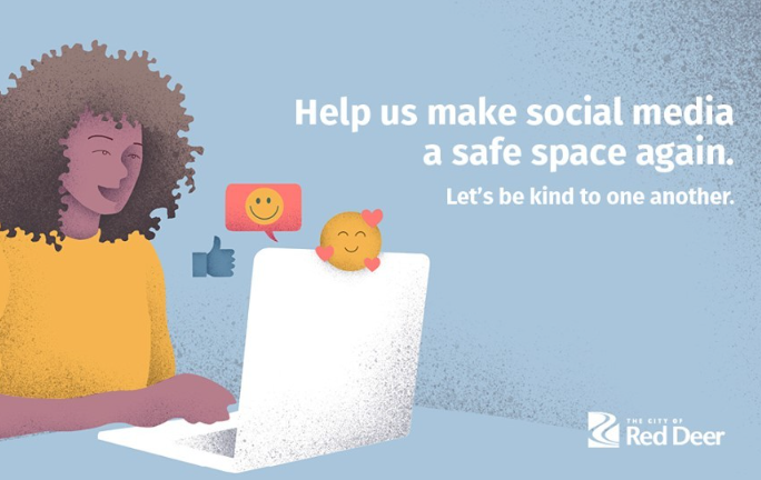 A screenshot of a City of Red Deer Instagram post featuring an illustrated graphic on a light blue background. The illustration shows a person seated at a laptop, with floating social media reaction icons such as thumbs‑up and smiling faces near the screen. White text reads, “Help us make social media a safe space again. Let’s be kind to one another.” The City of Red Deer logo appears in the bottom right corner. The post caption beside the image discusses encouraging positive engagement and kindness on social media.